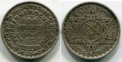 Монета серебряная 100 франков 1953 года. Марокко