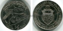 Монета 1/2 динара 1997 года. Тунис
