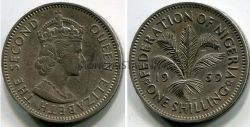 Монета 1 шиллинг 1959 года. Нигерия